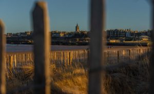St Salvator's Chapel Tower skyline from the West Sands with sand dunes. © The University of St Andrews.