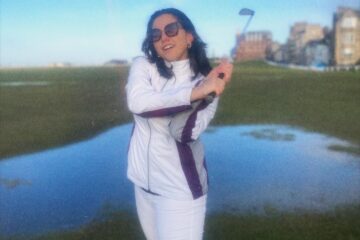 Student playing golf